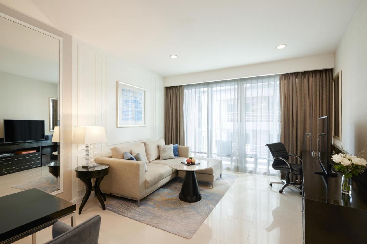 曼谷拉差达姆里都喜套房酒店 外观 照片 A living room in a serviced apartment in Singapore