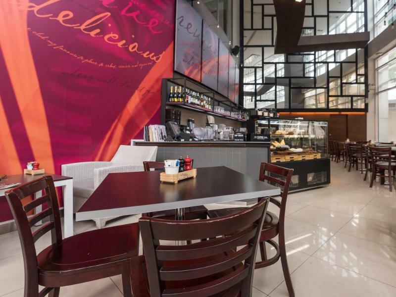 曼谷拉差达姆里都喜套房酒店 外观 照片 Interior of a typical café